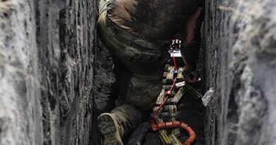 An Australian Army explosive ordnance disposal technician on Operation Render Safe 26 prepares a charge to destroy unexploded ordnance in Rabaul, Papua New Guinea. Photo by Sergeant Andrew Sleeman.