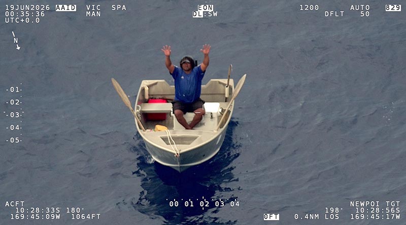 A missing Cook Islands fisherman waves to the crew of the RNZAF P-8A after they found him west of Pukapuka Island. RNZDF photo supplied.