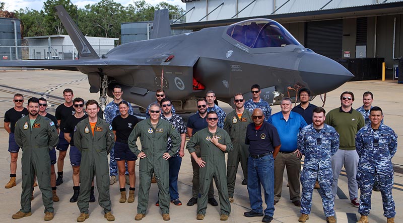 Royal Australian Air Force personnel and United States partners stand in front of an F-35A Lightning II following a joint Weapon Fill Measurement Vehicle flight test. Photo by Corporal Brooke Stewart.