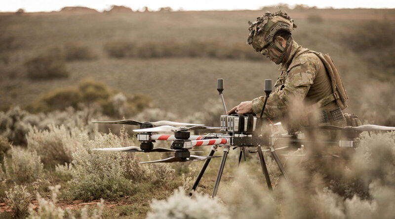Craftsman Jeremy Tjong prepares the Callisto 50 heavy-lift uncrewed aerial system at Cultana Training Area during Exercise Black Prince 3. Story by Major Peter Nugent.