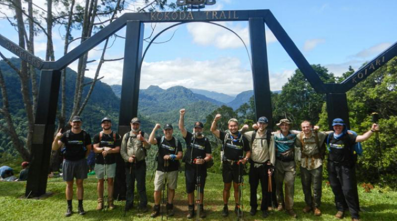 Air Force personnel celebrate at the Ower’s Corner Kokoda Track monument, Papua New Guinea. Story by Taster Murdoch.