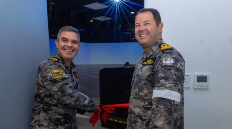 Commander Submarine Force Commodore Daniel Sutherland and Commodore Flotillas Commodore Simon Howard open the new submarine bridge simulator during a ribbon-cutting ceremony at the Submarine Training and Systems Centre, HMAS Stirling. Story by Lieutenant Joshua Sewell. Photo by Leading Seaman Zac Dingle.