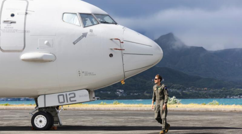Royal Australian Air Force Flight Lieutenant Oscar Borton, a tactical coordinator from 11 Squadron, conducts a pre-flight check on a P-8A Poseidon prior to a mission during Exercise Rim of the Pacific at Marine Corps Base Hawaii. Story by Flight Lieutenant Rob Hodgson. Photos by Leading Aircraftwoman Taylor Anderson.