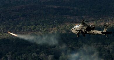 An Australian AH-64E Apache from 1st Aviation Regiment conducts gunnery activities during Exercise Possum Guns at Townsville Field Training Area. Photo by Sergeant Samuel Miller.