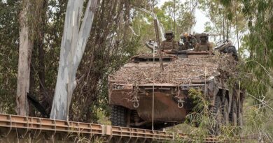 An Australian Army Boxer combat reconnaissance vehicle drives over a Dry Support Bridge during Exercise Talisman Sabre 23. Photo by Corporal Nicole Dorrett.