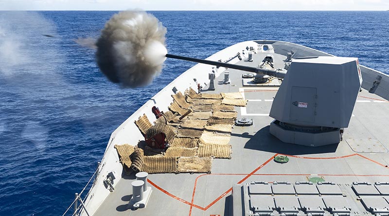 HMAS Sydney (V) conducts a 5-inch Mark 45 62-calibre gun serial during the RIMPAC 2026 sea phase. Photo by Leading Seaman Lauren Pugsley.