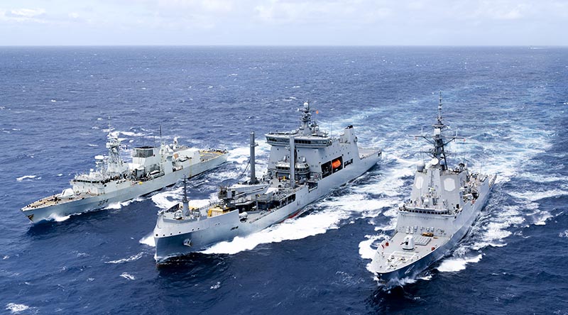Royal Canadian Navy Halifax-class frigate HMCS Regina, Royal New Zealand Navy Polar-class auxiliary ship HMNZS Aotearoa and Royal Australian Navy Hobart-class destroyer HMAS Sydney conduct a dual replenishment at sea during the sea during RIMPAC 2026 off the coast of Hawaii. Photo by Leading Seaman Lauren Pugsley.