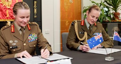 The new Chief of the Australian Army Lieutenant General Susan Coyle (left) with the Chief of the New Zealand Army Major General Rose King at Australian Army Headquarters, Canberra, sign a renewed Plan ANZAC. Photo. by Corporal Robert Whitmore.