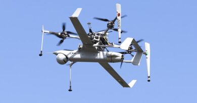 The flying launch and recovery system (FLARES) carries an Integrator UAV to launch altitude during a vertical-take-off-and-landing (VTOL) capability display at Jervis Bay Airfield. Photo by Leading Seaman Danyellah Hill.