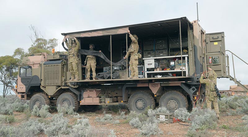Australian Army personnel from the 1st Armoured Regiment trial advanced manufacturing during Exercise Black Prince 3, operating from a heavy stores module converted to a deployable advanced manufacturing shelter, at Cultana Training Area, South Australia. Photo by Michael Guo.