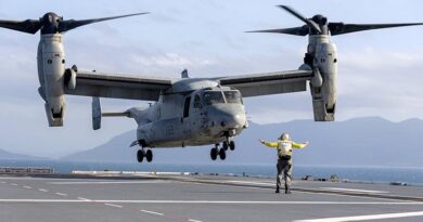 A United States Marine Corps MV-22 Osprey from the Marine Rotational Force - Darwin lands on board HMAS Canberra as part of a force integration training exercise off Queensland, Australia. Photo by Lieutenant Peter Allen.