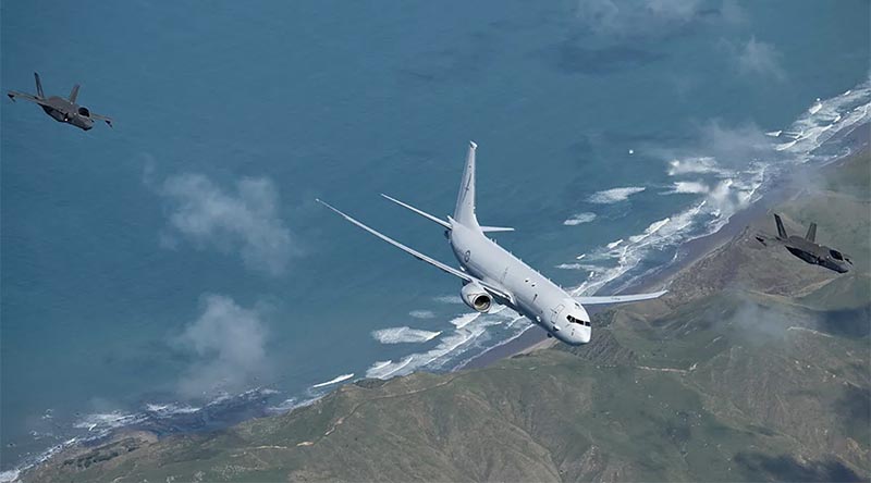 Two RAAF F-35A Lightning II jets conduct an air interception alongside a Royal New Zealand Air Force P-8A Poseidon over New Zealand's North Island east coast during Exercise Agile Tasman. Photo by Corporal Naomi James.