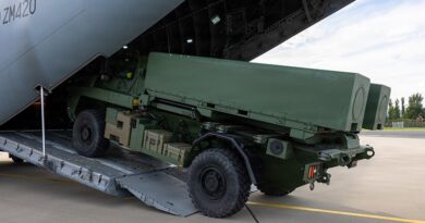 U.S. Marines with 1st Battalion, 10th Marines and U.K. Airmen with RAF Brize Norton prepare to load an Australian Strike Master Coastal Defense System inside an Airbus A400M Atlas in Trondheim, Norway, Aug. 28, 2026, during Atlantic City 26. The operation is a Norwegian-led trilateral readiness initiative with the United Kingdom and United States, designed to develop and demonstrate expeditionary advanced base capabilities and validate combined fires, maritime domain awareness, and sea denial to reinforce the security and stability of the High North. (U.S. Marine Corps photo by Sgt. Kedrick Schumacher)