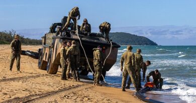 Australian Army soldiers from the 10th Force Support Battalion attach a DRACONE to a Light Amphibious Resupply Cargo Vehicle during Exercise Overland Nautical Petros 26.
