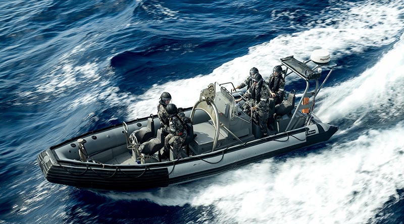 HMAS Perth crewmembers conduct boat drills off the coast of Vietnam in the South China Sea during an Indo-Pacific Regional Presence Deployment. Photo by Leading Seaman Connor Morrison.