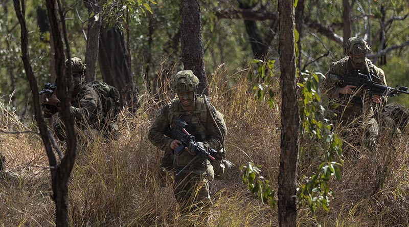 Australian Army soldiers assault the main defensive position during the culminating activity of Exercise Pozieres Run in Shoalwater Bay Training Area, Queensland. Photo by Trooper Wade Musicka.