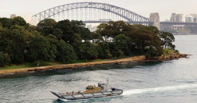 An AS21 Redback infantry fighting vehicle is transported on a Royal Australian Navy LCM-1E landing craft at Garden Island, Sydney Harbour. Photo by Sergeant Tristan Kennedy.