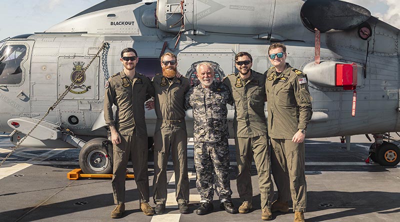 Leading Seaman Daniel Heuston, Lieutenant Noah Learoyd, James Rutledge, Leading Seaman Justin Howes and Lieutenant James Craig following a successful search and rescue mission conducted with HMAS Supply’s embarked MH‑60R Seahawk during Regional Presence Deployment 2026. Photo by Able Seaman Jaxsen Shinners.