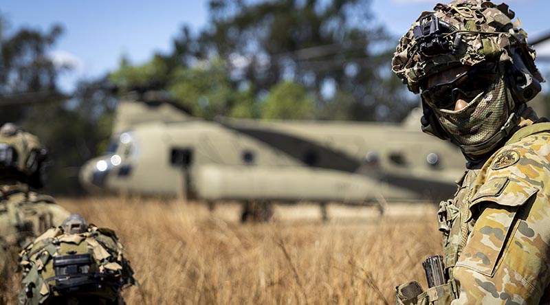 Australian Army soldiers from 1st Battalion, Royal Australian Regiment, prepare to board a CH-47 Chinook during Exercise Septimus Strike at Townsville Field Training Area, Queensland. Photo by Private Cooper Boyce.