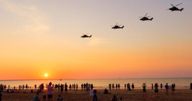 Four Tiger armed reconnaissance helicopter conduct a farewell flyover of Mindil Beach, Darwin. Photographer unknown.