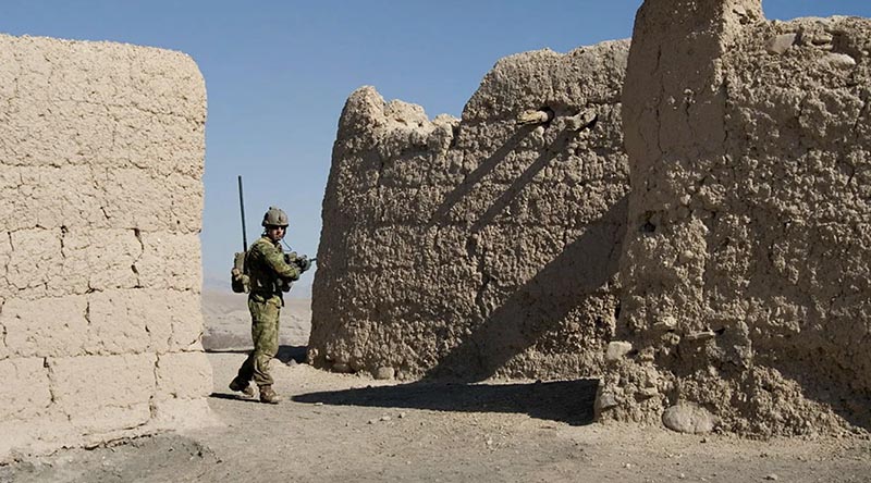 An Australian Army soldier from 5RAR patrols in the Mirabad Valley, Afghanistan during Mentoring Task Force 2 in 2011. Photo by Private Matt Bickerton.