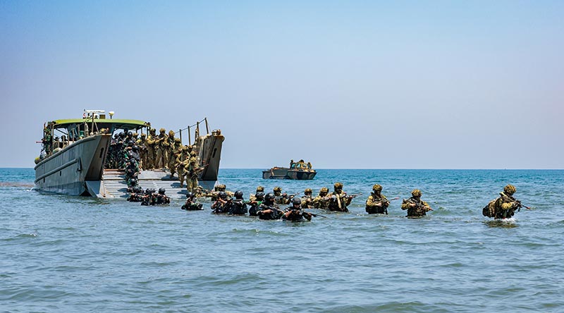 Soldiers from the Australian Army and Indonesian Armed Forces marines conduct an amphibious landing from an LCM-8 at Banongan Beach, Indonesia, during Exercise Keris Woomera 2026. Photo by Captain Annie Richardson.