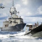 Sydney and Stuart cross wakes in South China Sea