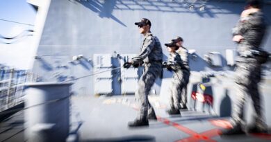 Members of HMAS Sydney (V) monitor the distance line during a replenishment at sea with HMNZS Aotearoa during transit through the South China Sea. Photo by Leading Seaman Lauren Pugsley.