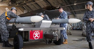 No. 75 Squadron Armament Technician Corporal Luke Corkery assists Japan Air Self-Defense Force personnel as they unload weapons from a JASDF F-35A Joint Strike Fighter at Komatsu Air Base during Exercise Keen Sword 27. Photo by Leading Aircraftman Ivan Smotrov.