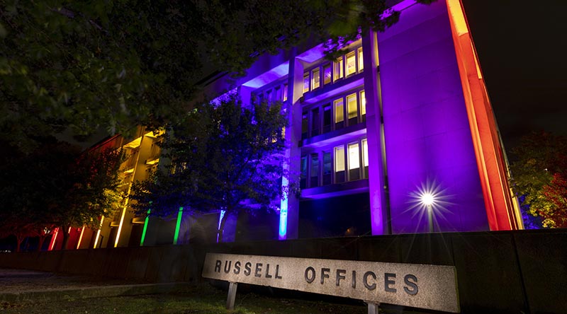 Russell Offices in Canberra, ACT, lit up in support of Sydney’s Gay and Lesbian Mardi Gras Parade for World Pride Month, 2023. Photo by Lauren Larking.