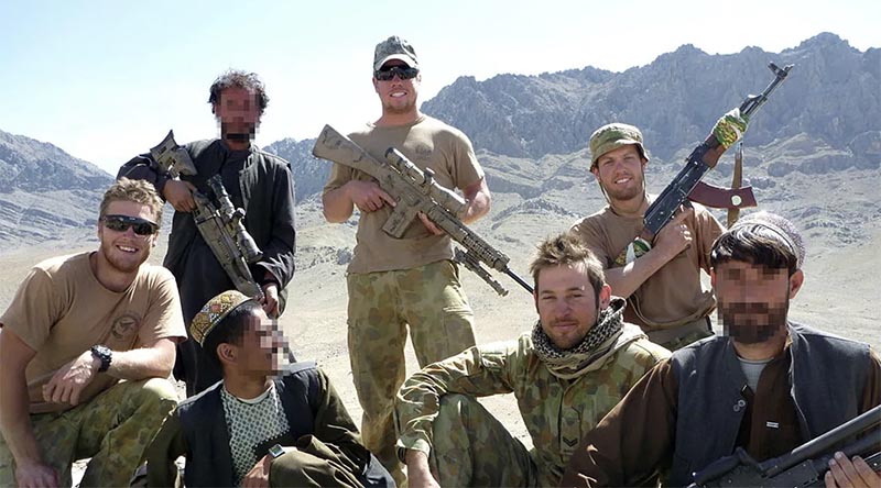 Australian Army snipers from call sign 63-X-ray, 5RAR, with militiamen at an Afghan militia camp in the Chora Valley, Afghanistan. Photo digitally altered for security.