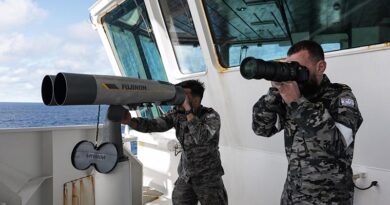Royal Australian Navy Boatswains Mates Able Seaman Christopher Diviak and Jai Coots survey a vessel from ADV Reliant during Operation Nasse 2026. Photo by Corporal Maddison Scott.
