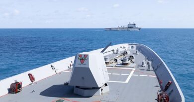 HMAS Sydney (V) sails in company with HMAS Choules off the North Coast of Australia during a Regional Presence Deployment. Photo by Leading Seaman Lauren Pugsley.